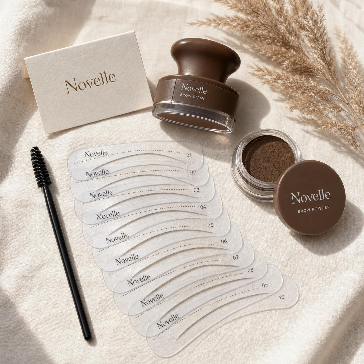 Each kit includes stamp, powder, 10 stencils, and spoolie